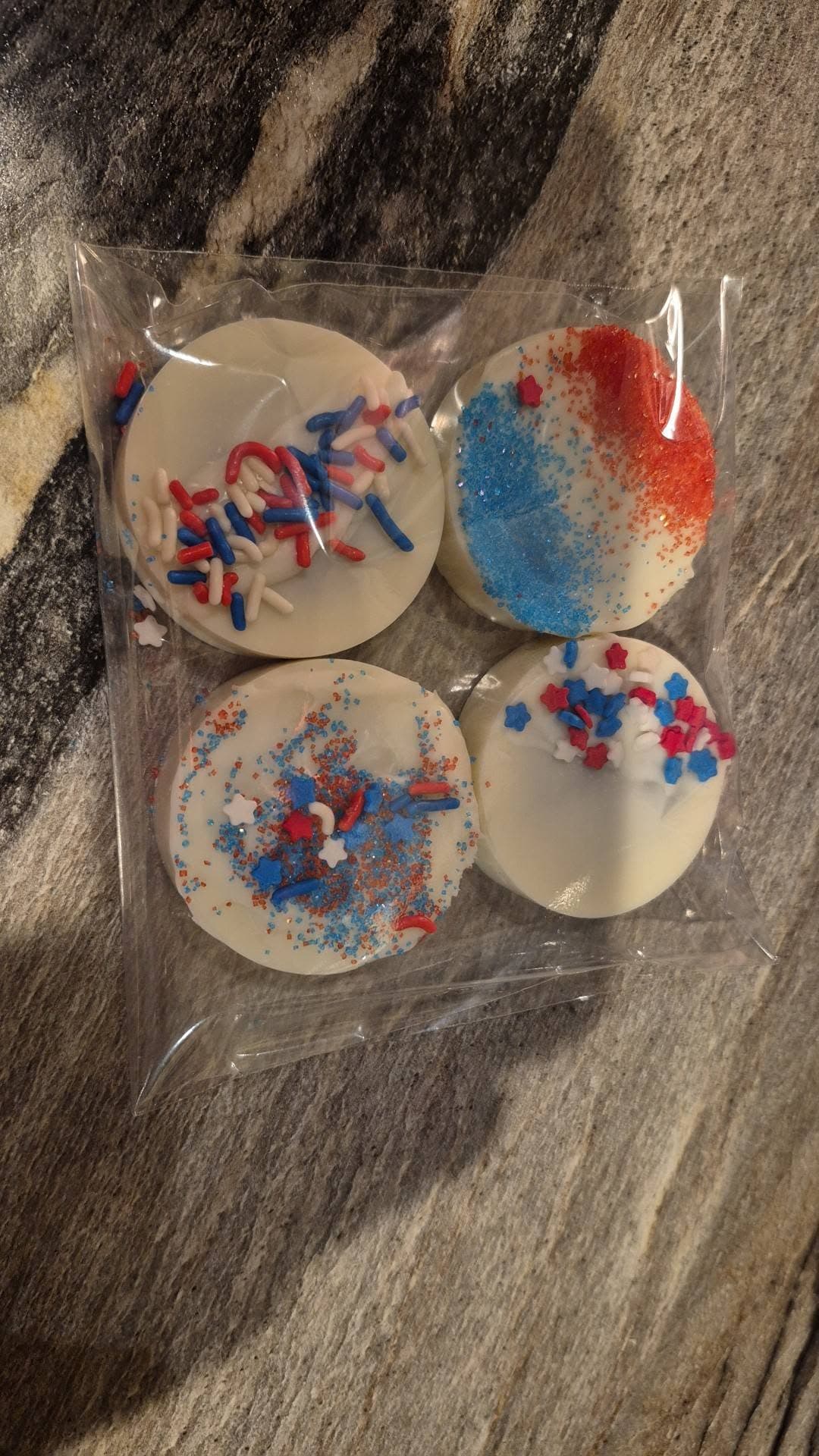 Patriotic cake pops with red white and blue sprinkle decorations