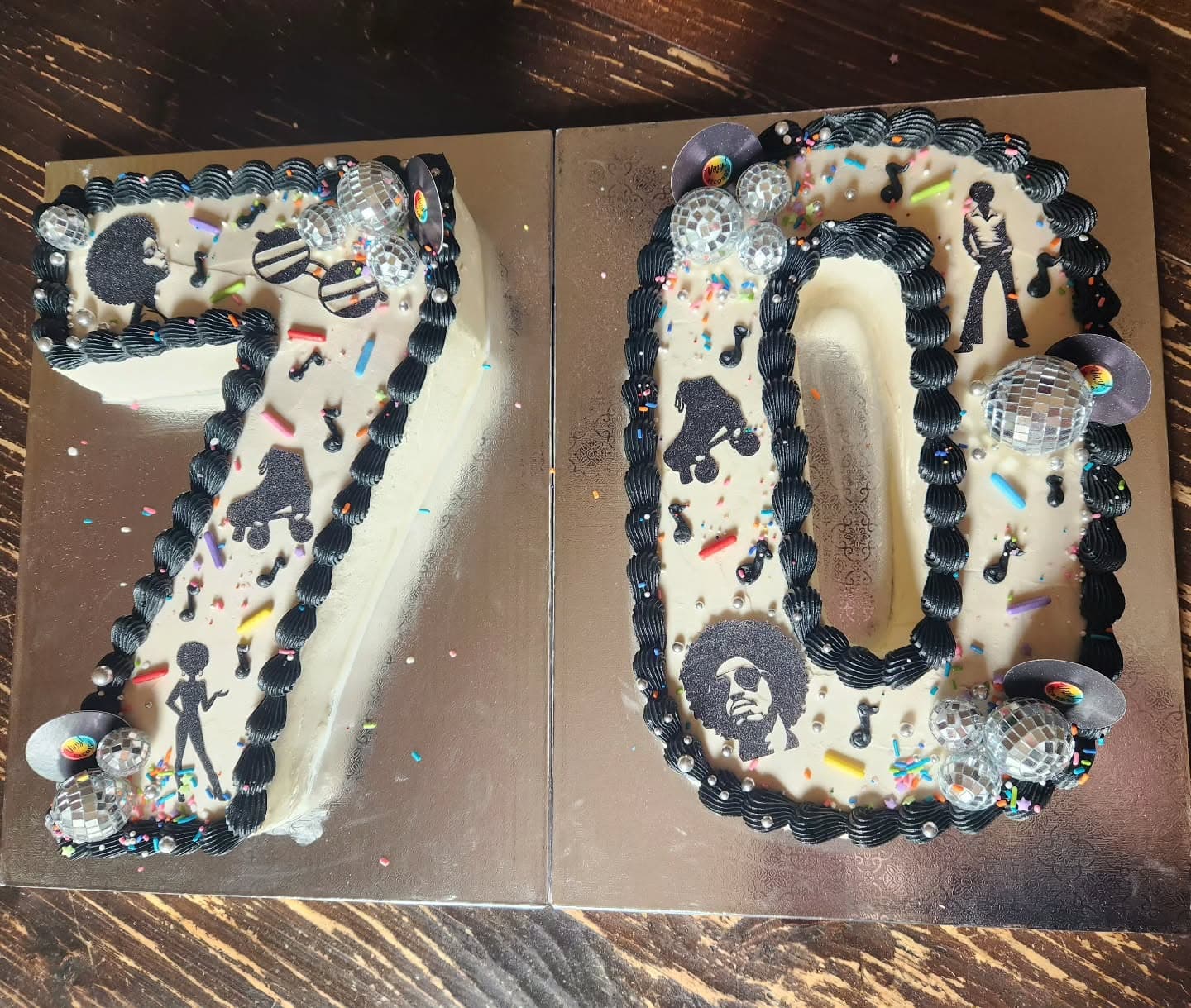 Number-shaped cakes forming 70 filled with colorful sprinkles